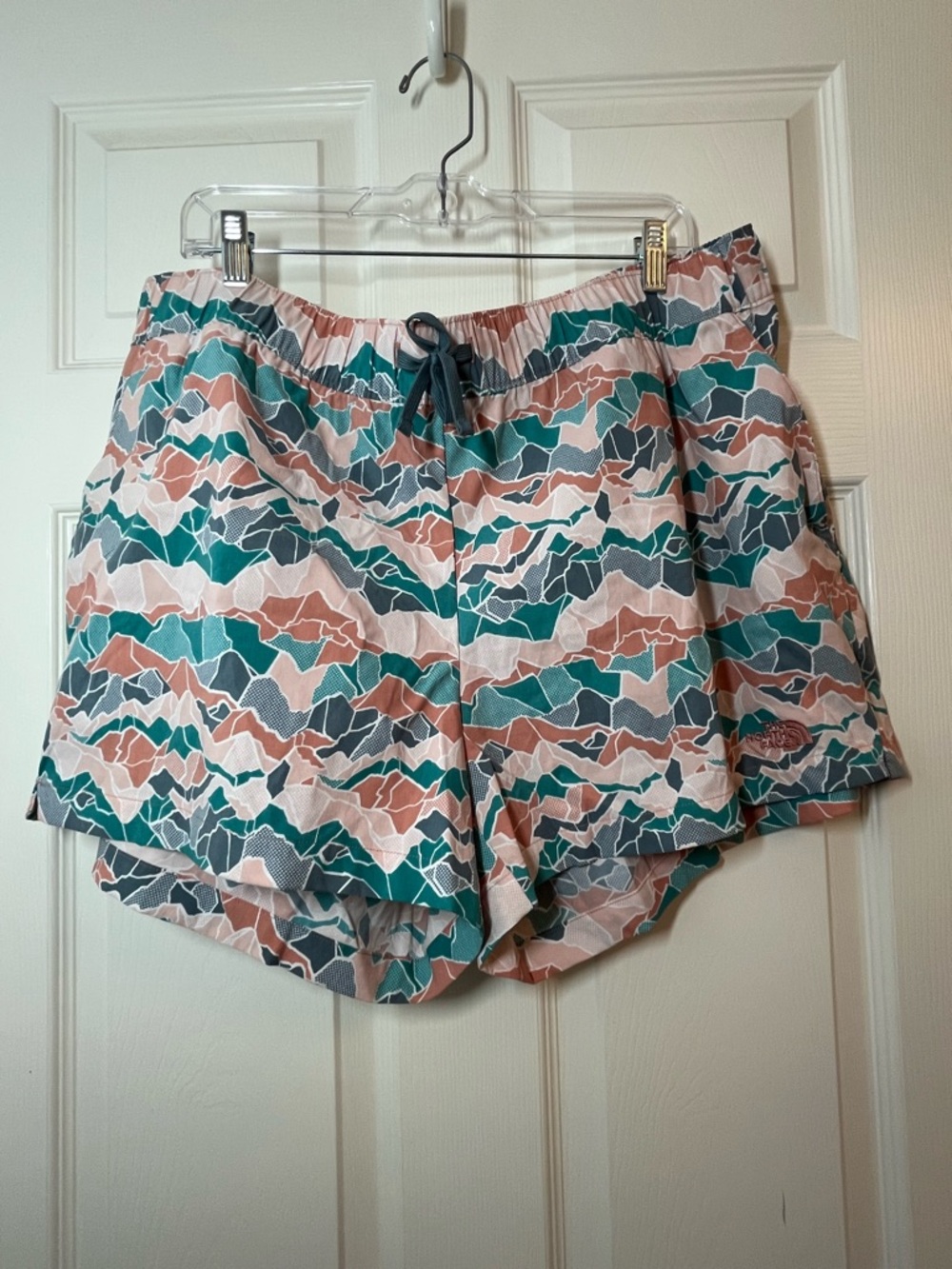 The North Face Women's Patterned Athletic Shorts in Teal & Pink